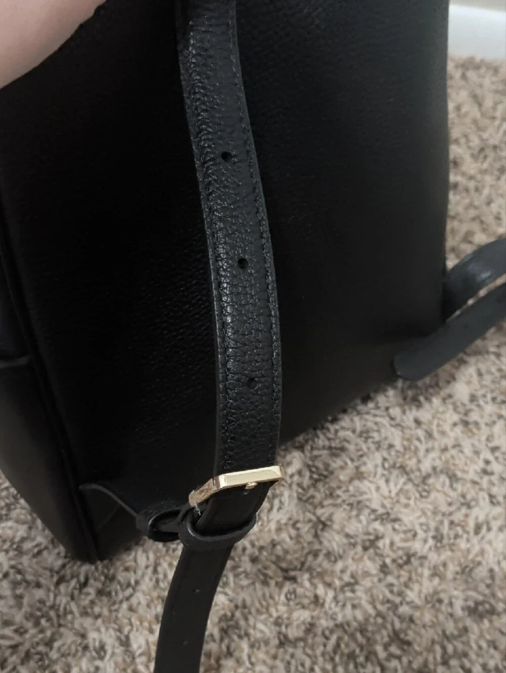 Kate Spade Leila black pebbled leather medium dome backpack with gold hardware